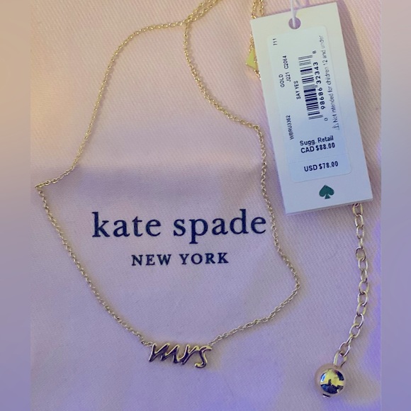 NWT♠️Don’t miss out! ♠️ Kate Spade’s Say Yes necklace ♠️ w/pink drawstring bag - Picture 1 of 7